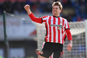 Dennis Cirkin celebrates his goal at Cardiff City