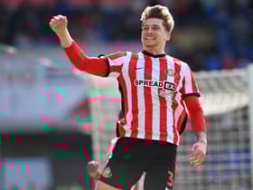 Dennis Cirkin celebrates his goal at Cardiff City