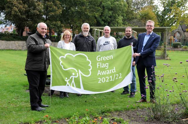 South Tyneside Council Cllr Ernest Gibson and Glenn Thomspon with Friends of Readhead Park, South Shields, Adrienne Arthur, Martin Kaupa, Bruce Watson and Paul Brenen, with the parks Green Flag Award.