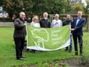South Tyneside Council Cllr Ernest Gibson and Glenn Thomspon with Friends of Readhead Park, South Shields, Adrienne Arthur, Martin Kaupa, Bruce Watson and Paul Brenen, with the parks Green Flag Award.