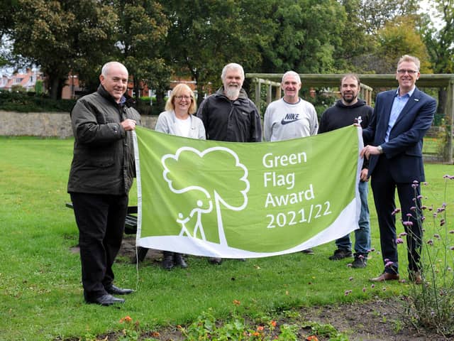 South Tyneside Council Cllr Ernest Gibson and Glenn Thomspon with Friends of Readhead Park, South Shields, Adrienne Arthur, Martin Kaupa, Bruce Watson and Paul Brenen, with the parks Green Flag Award.