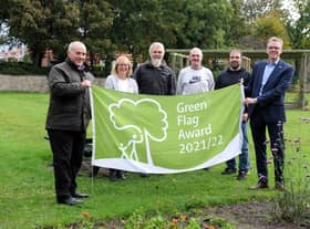 South Tyneside Council Cllr Ernest Gibson and Glenn Thomspon with Friends of Readhead Park, South Shields, Adrienne Arthur, Martin Kaupa, Bruce Watson and Paul Brenen, with the parks Green Flag Award.
