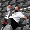 Newcastle United's English owner Mike Ashley (R) watches the English Premier League football match between Newcastle United and Brighton and Hove Albion at St James' Park in Newcastle upon Tyne, north-east England on September 20, 2020.