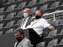 Newcastle United's English owner Mike Ashley (R) watches the English Premier League football match between Newcastle United and Brighton and Hove Albion at St James' Park in Newcastle upon Tyne, north-east England on September 20, 2020.