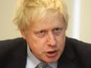 Prime Minister Boris Johnson is under fire for his handling of school exams and plans for a return to the classroom.