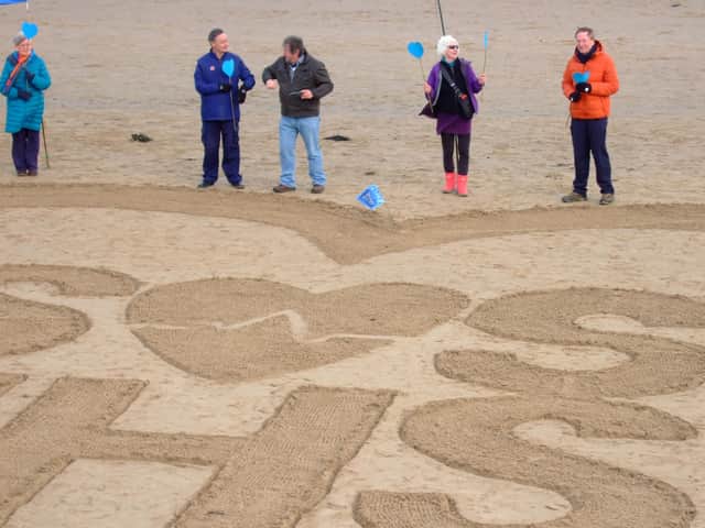 Campaigners mark SOS-NHS day of action on coast.