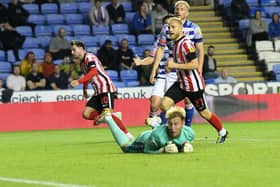 Patrick Roberts scores for Sunderland against Reading.