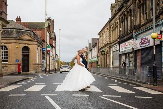 Julie and Gary Docherty recreated the Beatles Abbey Road album cover on a zebra crossing in Jarrow. Photo by Victoria Geldard.