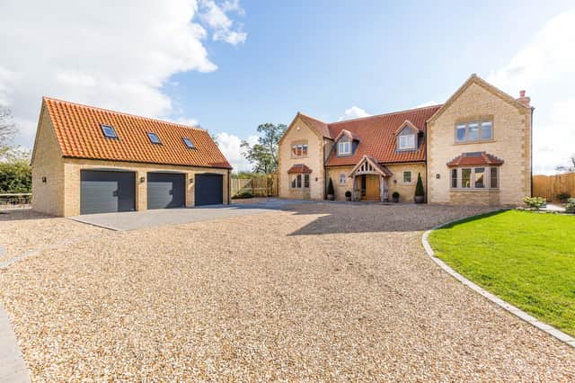 The property is in the village of Scothern and on the market with Savills for £850,000. Photo: Savills