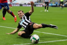 Newcastle United's Scottish midfielder Ryan Fraser stretches for the ball during the English League Cup second round football match between Newcastle United and Blackburn Rovers at St James' Park in Newcastle upon Tyne in north east England on September 15, 2020.