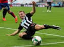 Newcastle United's Scottish midfielder Ryan Fraser stretches for the ball during the English League Cup second round football match between Newcastle United and Blackburn Rovers at St James' Park in Newcastle upon Tyne in north east England on September 15, 2020.