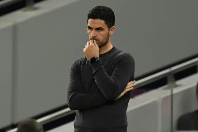 Arsenal's Spanish manager Mikel Arteta gestures on the touchline during the English Premier League football match between Tottenham Hotspur and Arsenal at Tottenham Hotspur Stadium in London, on May 12, 2022. (Photo by GLYN KIRK/AFP via Getty Images)
