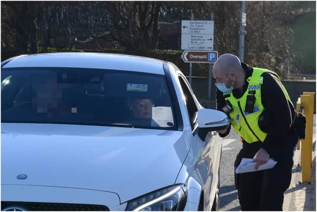 Northumbria Police were pictured handing out letters to drivers reminding them of the Government guidance on staying local. Picture: North News.