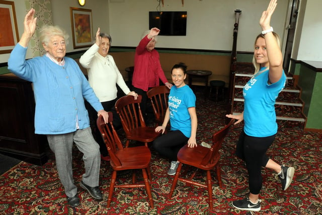 A balance and stability class to help people with their balance with Age UK trainer Nicola Bruce, right, and volunteer Amy Crammond, centre, playing their part.