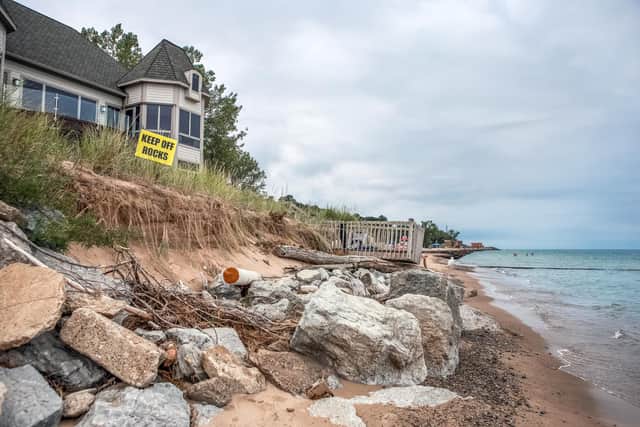 Many properties are at risk after the coastline slowly erodes away. Photo: Adobe