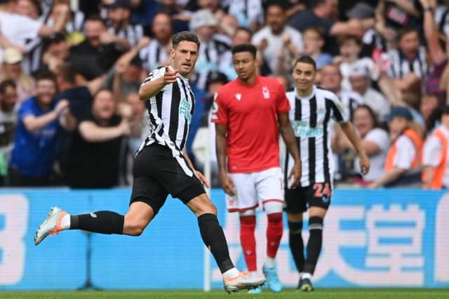 Fabian Schar of Newcastle United celebrates scoring their side's first goal during the Premier League match between Newcastle United and Nottingham Forest at St. James Park on August 06, 2022 in Newcastle upon Tyne, England. (Photo by Stu Forster/Getty Images)