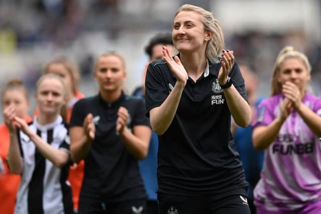 Newcastle United Women's manager Becky Langley applauds fans last season.