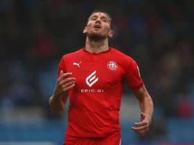 Charlie Wyke playing for Wigan Athletic.