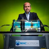 Michael Maughan, founder of MAC SciTech with reactor