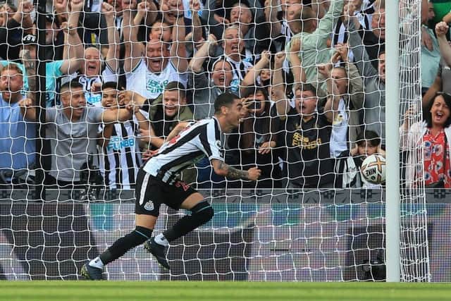 Newcastle United's Paraguayan midfielder Miguel Almiron celebrates after scoring his team first goal during the English Premier League football match between Newcastle United and Manchester City at St James' Park in Newcastle-upon-Tyne, north east England, on August 21, 2022. (Photo by LINDSEY PARNABY/AFP via Getty Images)