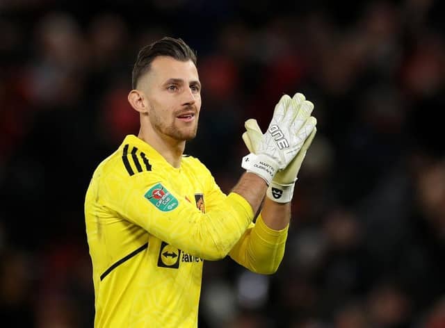 Manchester United's on-loan goakeeper Martin Dubravka applauds fans after making his debut.