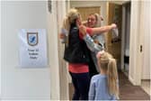 Whitburn Church of England Academy students celebrate their A Level results with loved ones.
