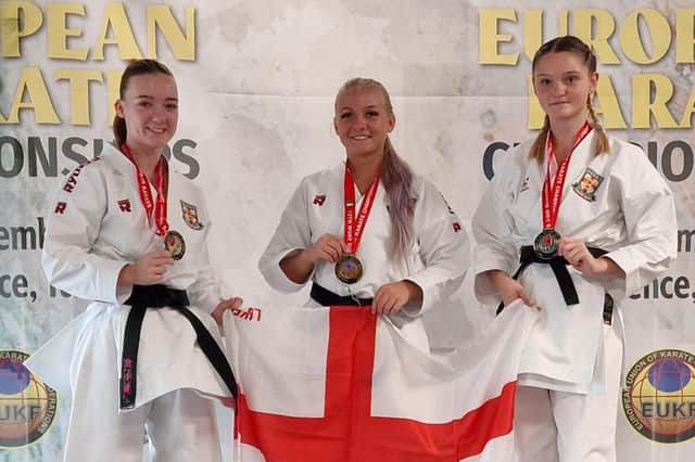 Elle Smith, Eleisha Mitchinson, Emma Snaith with their gold medals.