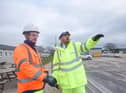 Transport minister Richard Holden (right) with contractor representative Luke Presho at the A585 Windy Harbour to Skippool site