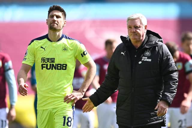 Federico Fernandez and Steve Bruce at Turf Moor.
