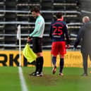 Callum McFadzean leaves the field during the 3-0 win over MK Dons