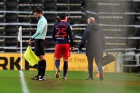 Callum McFadzean leaves the field during the 3-0 win over MK Dons