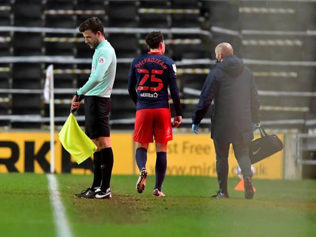 Callum McFadzean leaves the field during the 3-0 win over MK Dons