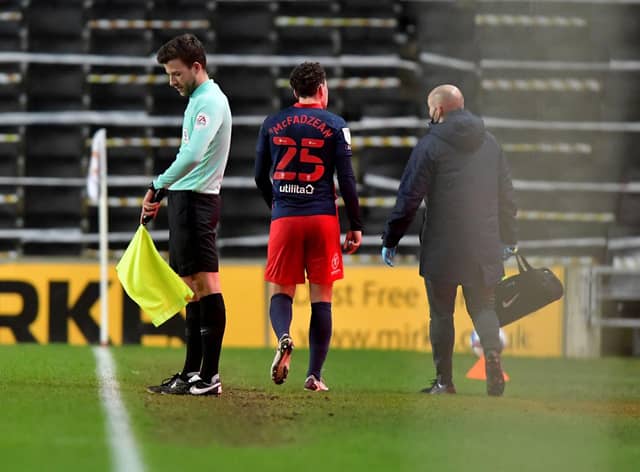 Callum McFadzean leaves the field during the 3-0 win over MK Dons