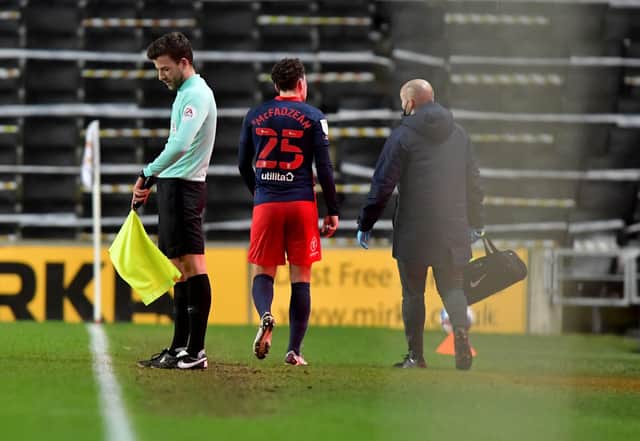 Callum McFadzean leaves the field during the 3-0 win over MK Dons