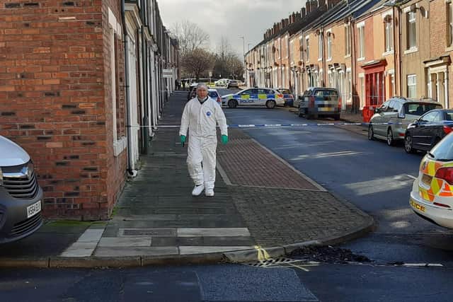Forensic officers carrying out work at the scene on Sunday, March 6.
