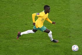 Garang Kuol and Australia have progressed to the Round of 16 at the World Cup (Photo by Stu Forster/Getty Images)