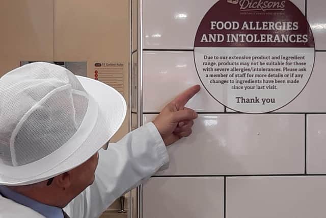 Environmental Health Officer David Jarvis checks allergen information and signage at MI Dicksons.