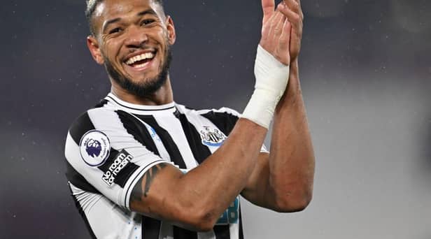 Newcastle United's Brazilian striker Joelinton applauds as he celebrates at the end of the English Premier League football match between West Ham United and Newcastle at the London Stadium, in London on April 5, 2023. (Photo by JUSTIN TALLIS/AFP via Getty Images)