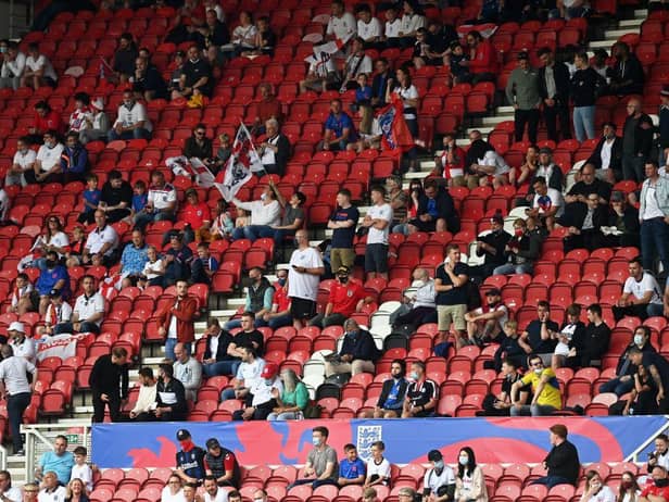 England fans. (Photo by PAUL ELLIS/POOL/AFP via Getty Images)