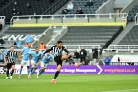 Joelinton of Newcastle United scores their side's second goal from the penalty spot during the Premier League match between Newcastle United and Manchester City at St. James Park on May 14, 2021 in Newcastle upon Tyne, England.