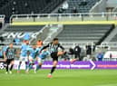 Joelinton of Newcastle United scores their side's second goal from the penalty spot during the Premier League match between Newcastle United and Manchester City at St. James Park on May 14, 2021 in Newcastle upon Tyne, England.