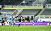 Joelinton of Newcastle United scores their side's second goal from the penalty spot during the Premier League match between Newcastle United and Manchester City at St. James Park on May 14, 2021 in Newcastle upon Tyne, England.