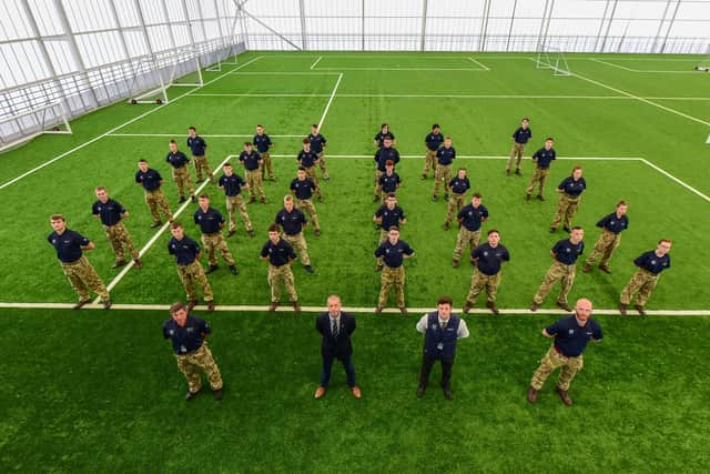 Standing with students at the Beacon of Light, from left to right, Craig Hepburn training instructor, Laurence ‘Ronnie’ Corbett, regional operations manager, motivational preparation college for training (North), Connan Cuthbertson MPCT Sunderland Centre manager and Stephen, forrest skills tutor.