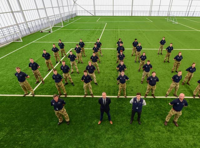 Standing with students at the Beacon of Light, from left to right, Craig Hepburn training instructor, Laurence ‘Ronnie’ Corbett, regional operations manager, motivational preparation college for training (North), Connan Cuthbertson MPCT Sunderland Centre manager and Stephen, forrest skills tutor.