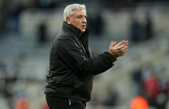 Steve Bruce applauds fans after the game.
