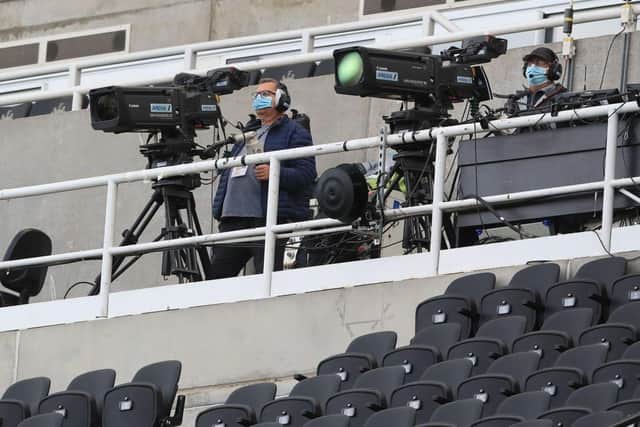 Broadcaster camera operators at St James's Park (Photo by OWEN HUMPHREYS/POOL/AFP via Getty Images)