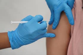 File photo dated 31/07/21 of a person receiving a Covid-19 jab. More than a million people in England have only had one Covid-19 vaccine, the NHS has said as it encouraged people to come forward for their second jab.