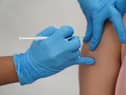 File photo dated 31/07/21 of a person receiving a Covid-19 jab. More than a million people in England have only had one Covid-19 vaccine, the NHS has said as it encouraged people to come forward for their second jab.