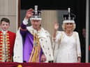 King Charles III and Queen Camilla on the balcony of Buckingham Palace following the coronation on May 6, 2023. Picture: Owen Humphreys/PA Wire.