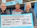 John Stewart and Mark William Young from Friends of Hebburn Cemetery with Deborah Roberts of Cancer Connections